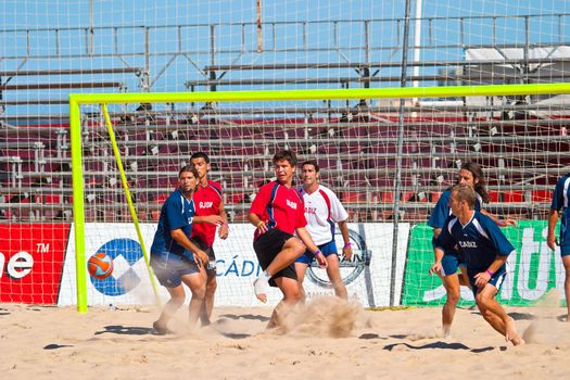 CADIZ, SPAIN -  JUL 30:  Unknown players of the team of Cadiz and Gijon playing the Spanish Championship of Beach Soccer on Jul 30, 2005 on the beach of La Victoria in Cadiz, Spain