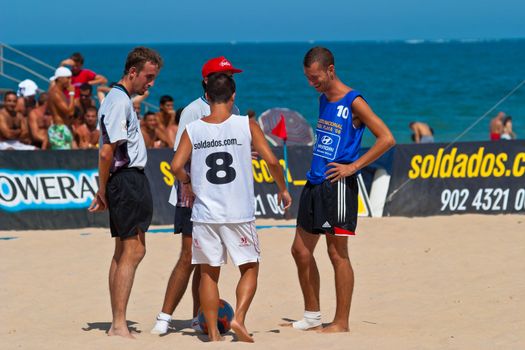 CADIZ, SPAIN -  JUL 22:  Unknown players of unknown team playing the Spanish Championship of Beach Soccer on Jul 22, 2006 on the beach of La Victoria in Cadiz, Spain