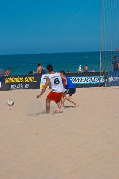 CADIZ, SPAIN -  JUL 22:  Unknown players of unknown team playing the Spanish Championship of Beach Soccer on Jul 22, 2006 on the beach of La Victoria in Cadiz, Spain