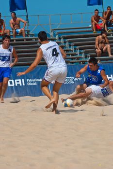 CADIZ, SPAIN -  JUL 22:  Unknown players of unknown team playing the Spanish Championship of Beach Soccer on Jul 22, 2006 on the beach of La Victoria in Cadiz, Spain