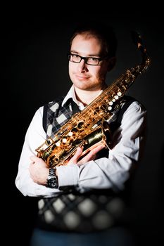 portrait of a man with a saxophone