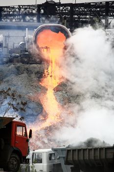 drain slag at steel plant