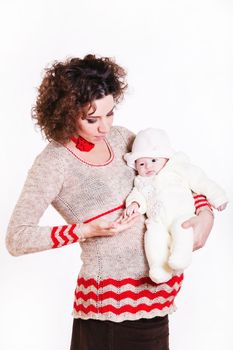 beautiful pregnant woman in a sweater with baby isolated on white background