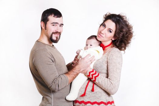 pregnant woman with her ​​husband and child isolated on white background