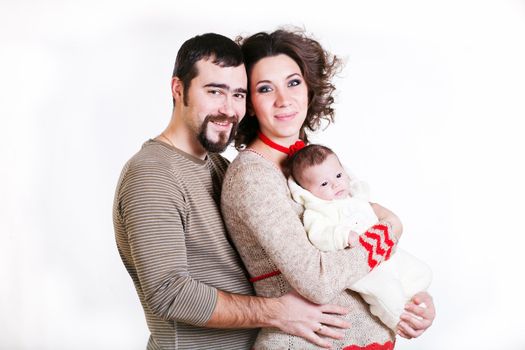 pregnant woman with her ​​husband and child isolated on white background