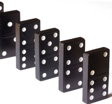 Row of black dominoes on white