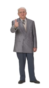 Optimist senior man with thumb up against a white background.