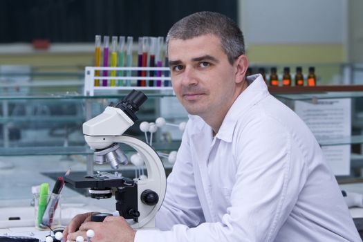 Portrait of a researcher at his workplace.