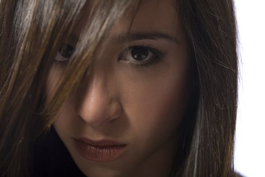 Studio portrait of a beautiful mixed race, vietnamese girl looking cute