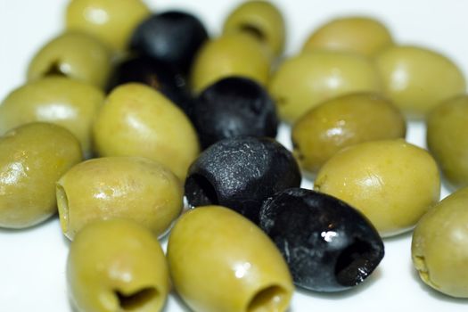 macro shot of green and black olives