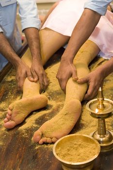 indian ayurvedic oil foot massage