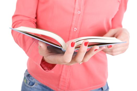 opened book in the hands of the girl