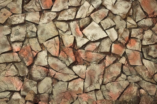 Structure of an old stone wall close up