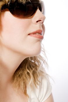 Studio portrait of a curly blond female