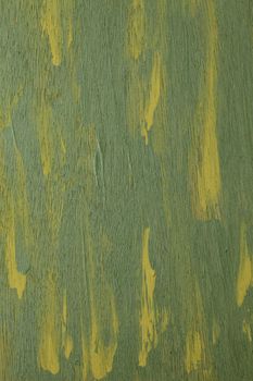 green and yellow  abstract with wood texture - acrylic paint on rough and grunge plywood