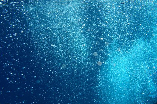 bubbles in fresh blue clear water in the red sea