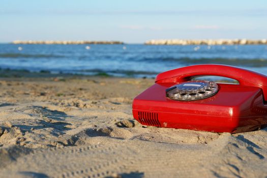 red phone on the beach............