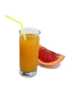 glass of orange juice with a straw and grapefruit isolated on white