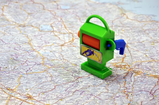 Toy Petrol-station on Italy map. Concept