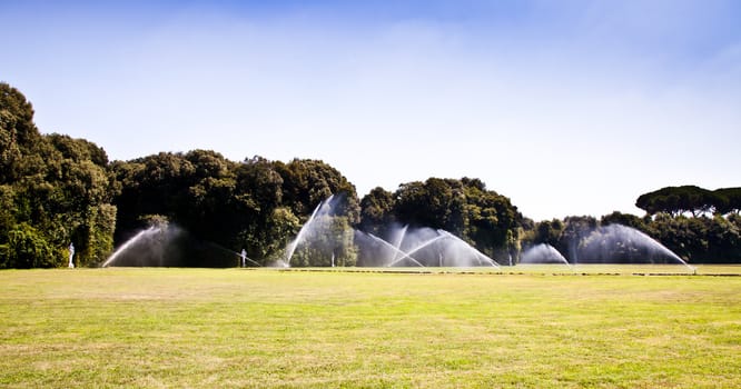 Reggia di Caserta (Caserta Royal Palace), Italy. Luxury royal garden: irrigation operations