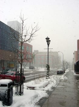 A downtown intersection shot during a blizzard.
