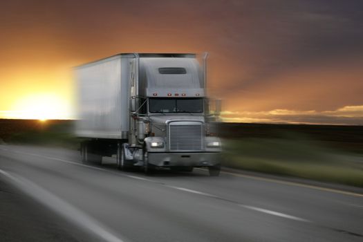 truck at sunset with motion blur