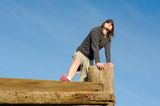 Guy standing on a vessel prow, a concept