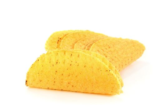 a couple of taco shells on a white background