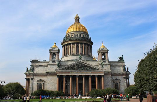 Cathedral of st. Isaak , St. Petersburg, Russia with trees in the foreground.