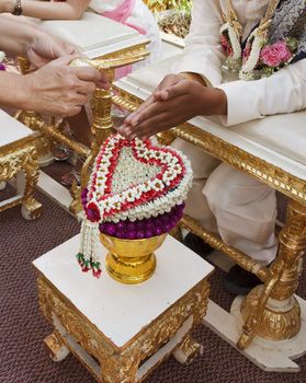 Blessed water at Thai wedding ceremony in Thailand