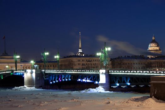 Palace Bridge spanning the Neva River in Saint Petersburg between Palace Square and Vasilievsky Island. Winter, night