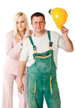 Businesswoman and construction worker standing on white background, man holding hardhat