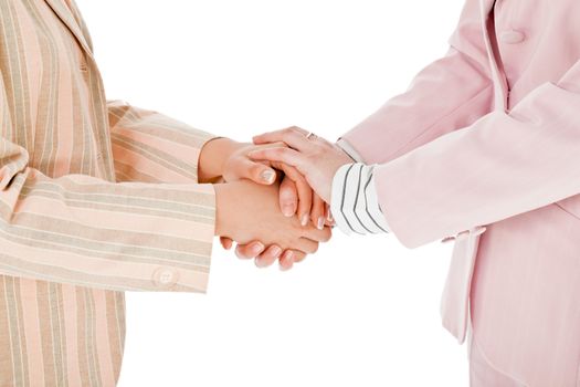 Cropped image of two women shaking hands with coppyspace