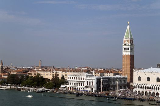 VENICE, ITALY - SEPTEMBER 25th, 2009 - The very busy Piazza San Marcos known for being Europe's outdoor living room with its famous bell tower and Basilica, taken on September 25th, 2009 in Venice, Italy