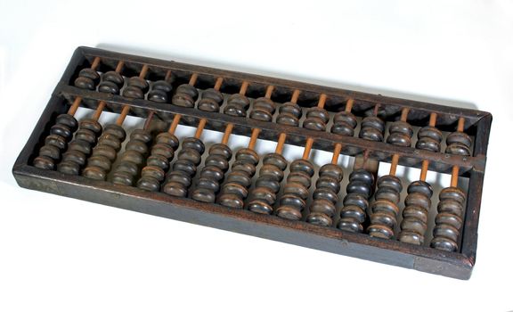Old wooden abacus on white