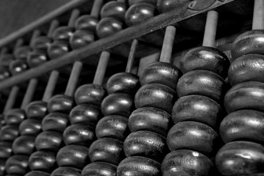 Old wooden abacus on white