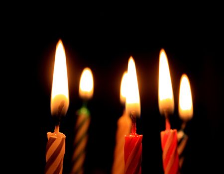 Candles isolated on black background