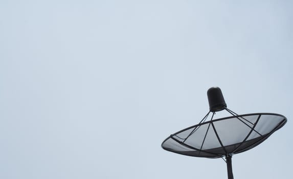 Satellite dish blue sky background