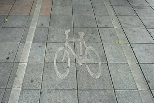 Bike lane symbol on road