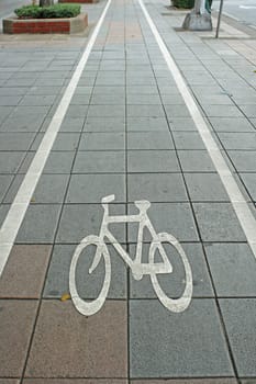 Bicycle lane symbol on road