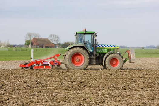 tractor on field, Friesland, Netherlands