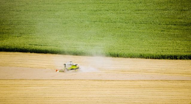 the combine harvester in the field