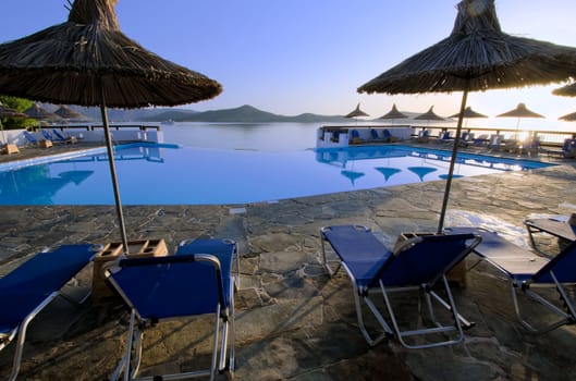 parasols  and lounge chairs at the pool