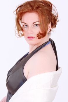 Portrait of an elegant red-headed Plus Size Model