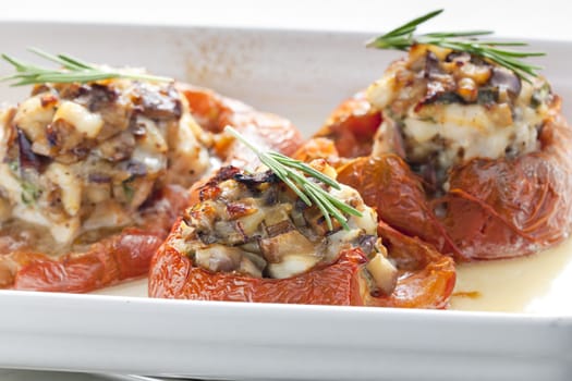 baked tomatoes with chicken meat and mushrooms