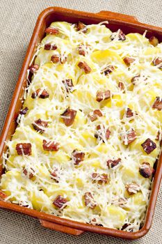 potatoes and bacon baked with pecorino cheese