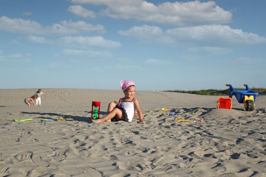 children playing in the sand