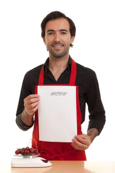 a chef holding an empty menu in front of him