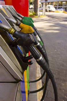 Raw of fuel pumps in a gas station.