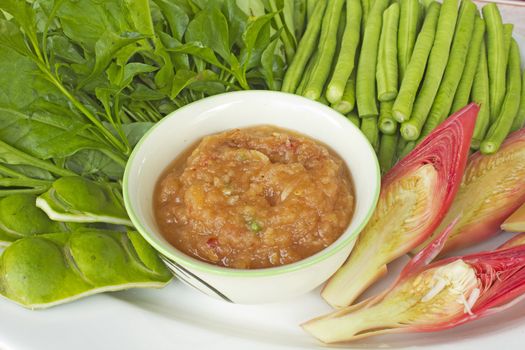 Sauce of shrimp paste and chili with fresh vegetables on plate